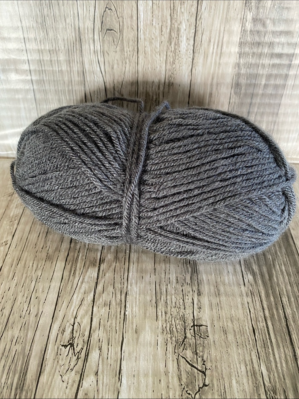1 BALL OF GRAY YARN